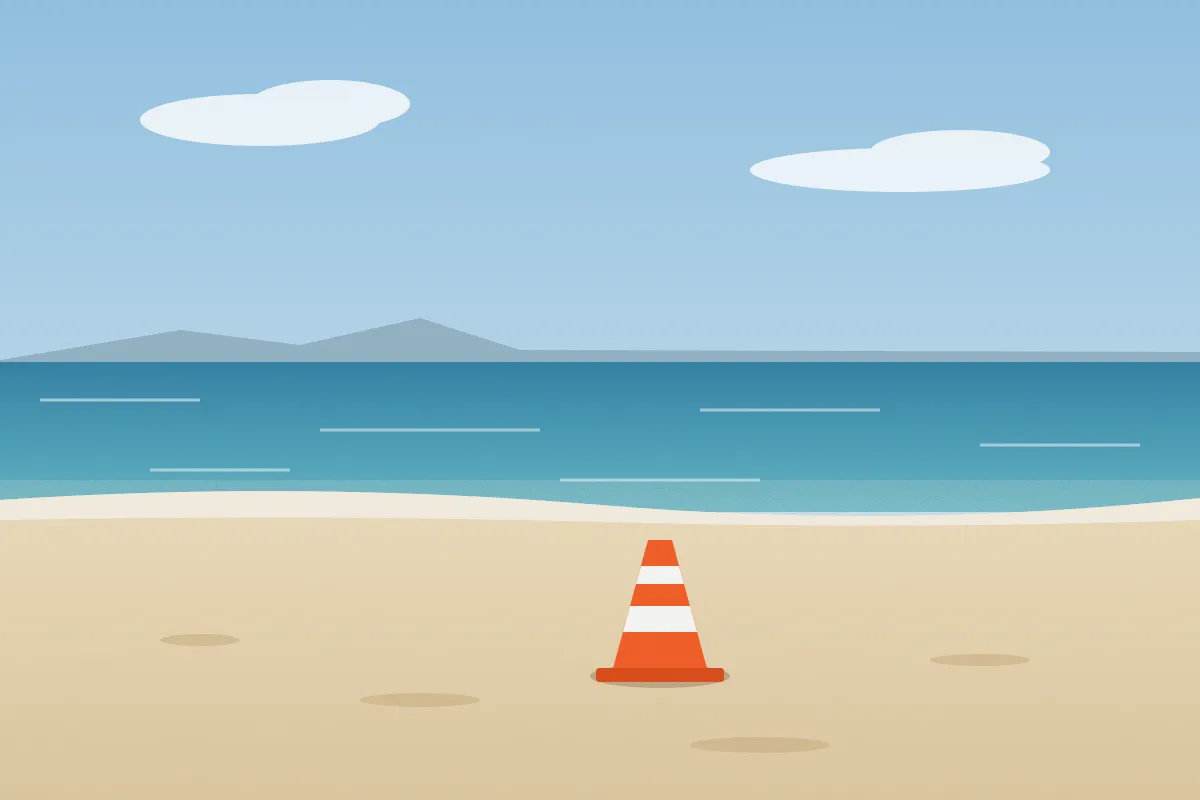 Before: a traffic cone on a beach, original